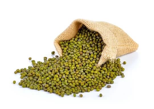 Green grams (ndengu) spilling from a small jute sack